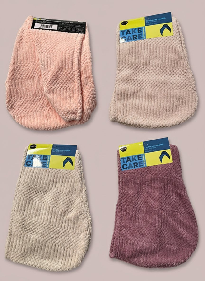 Quattro cuffie asciugacapelli in tessuto a nido d'ape nei colori rosa cipria, rosa intenso, bordeaux e beige con etichetta Ta