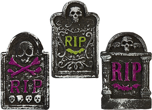 Tre lapidi decorative grigie con scritta RIP, teschi e ossa incrociate nei toni viola e verde