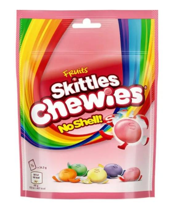 Busta rosa con arcobaleno di caramelle morbide alla frutta colorate, senza guscio