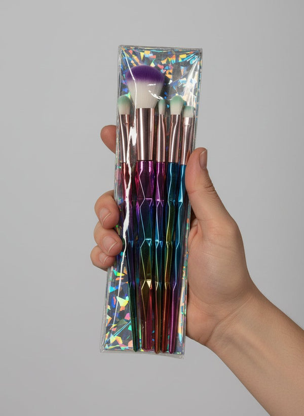 Set 5 pennelli trucco con manici metallici olografici e setole colorate, in confezione trasparente con fantasia arcobaleno