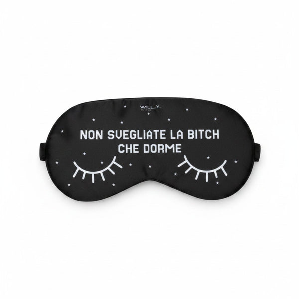 Maschera nera per occhi refrigerante con scritto non svegliate la bitch che dorme, ciglia disegnate e stelline bianche