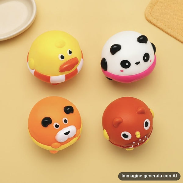 Set di quattro palline gioco per animali domestici con design kawaii, colori giallo, bianco, arancio e rosso con facce tenere