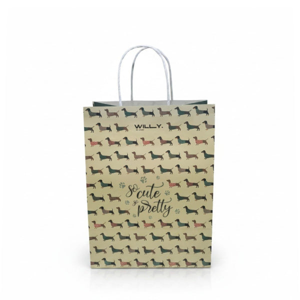 Shopper carta beige con pattern ripetuto di bassotti colorati e scritta so cute and pretty, manici bianchi