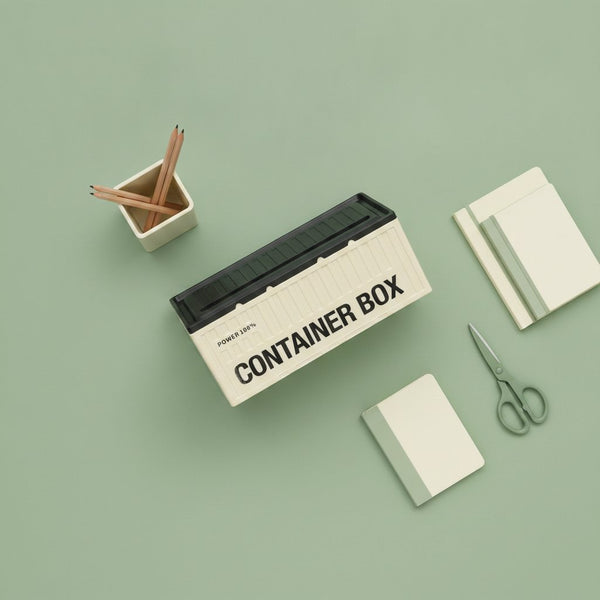 Contenitore box a forma di container navale in colore beige e nero con coperchio rimovibile e manici