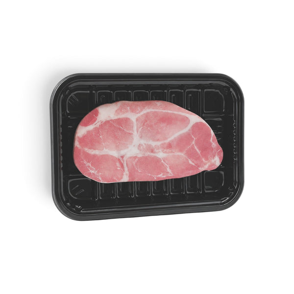 Foglietti adesivi a forma di fetta di carne appoggiati su una vaschetta nera da banco frigo