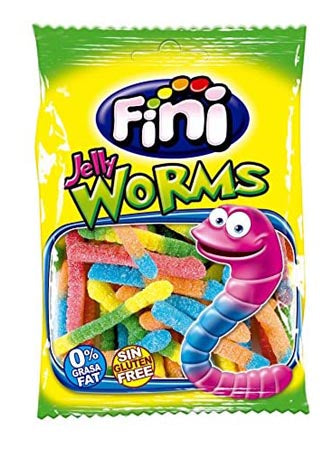 Busta verde di caramelle gommose a forma di vermi colorati zuccherati con verme sorridente disegnato