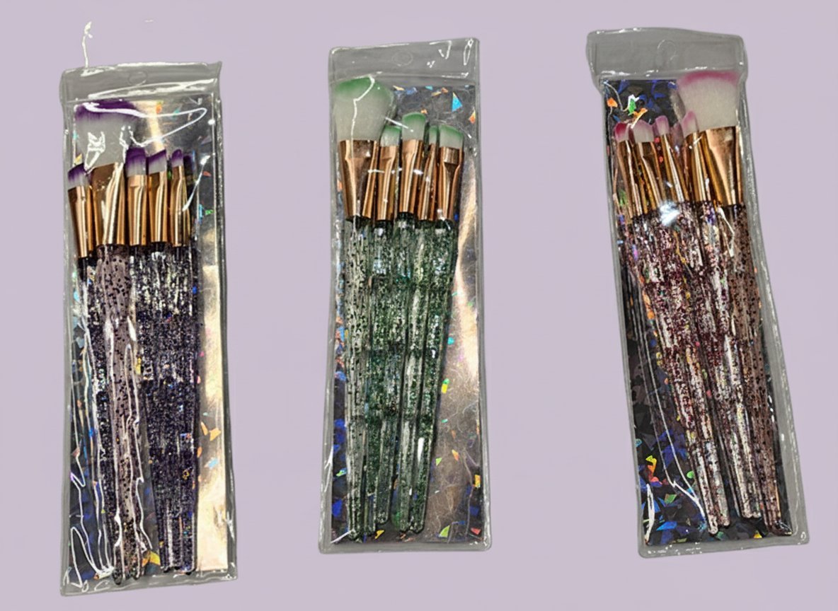 Set 5 pennelli trucco manico dorato con setole colorate, fantasia glitter e fiori, packaging trasparente